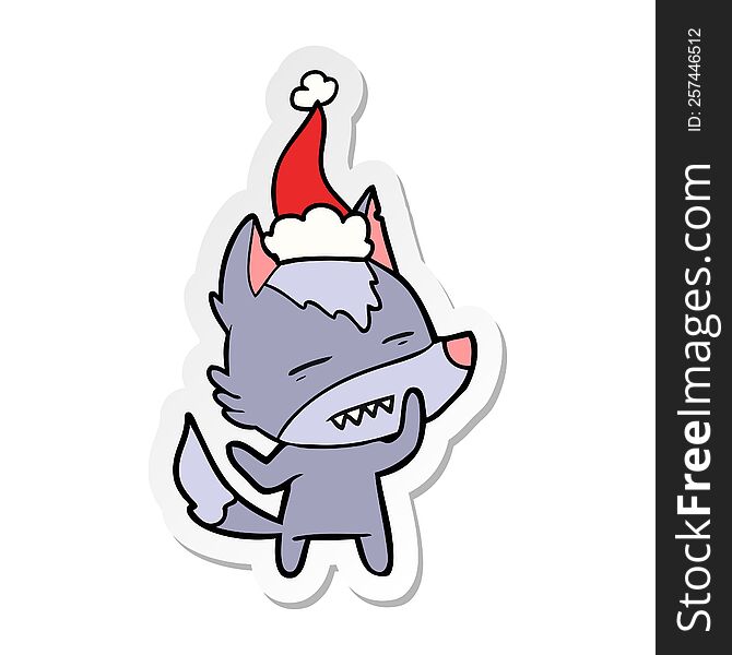 Sticker Cartoon Of A Wolf Showing Teeth Wearing Santa Hat