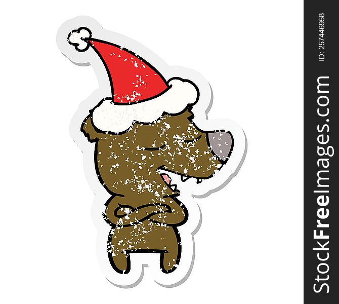Distressed Sticker Cartoon Of A Bear Wearing Santa Hat