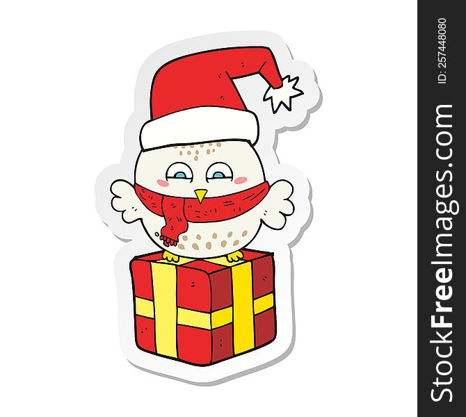 sticker of a cartoon cute christmas owl on gift