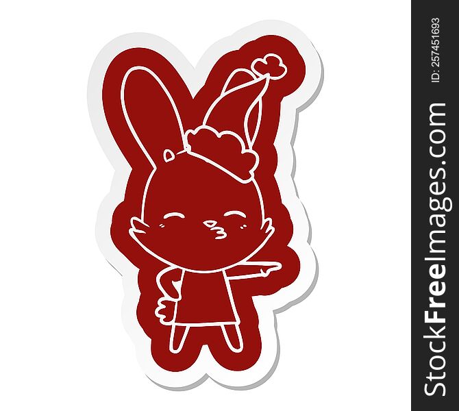 curious bunny quirky cartoon  sticker of a wearing santa hat