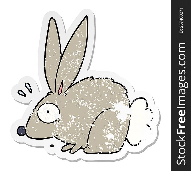 Distressed Sticker Of A Cartoon Frightened Rabbit
