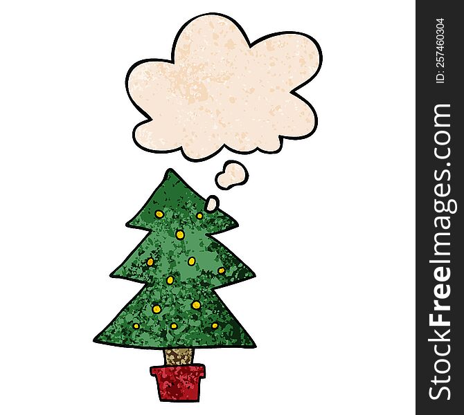 cartoon christmas tree with thought bubble in grunge texture style. cartoon christmas tree with thought bubble in grunge texture style