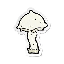 Retro Distressed Sticker Of A Cartoon Mushroom Royalty Free Stock Photography