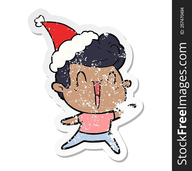 distressed sticker cartoon of a excited man wearing santa hat