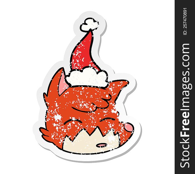 hand drawn distressed sticker cartoon of a fox face wearing santa hat