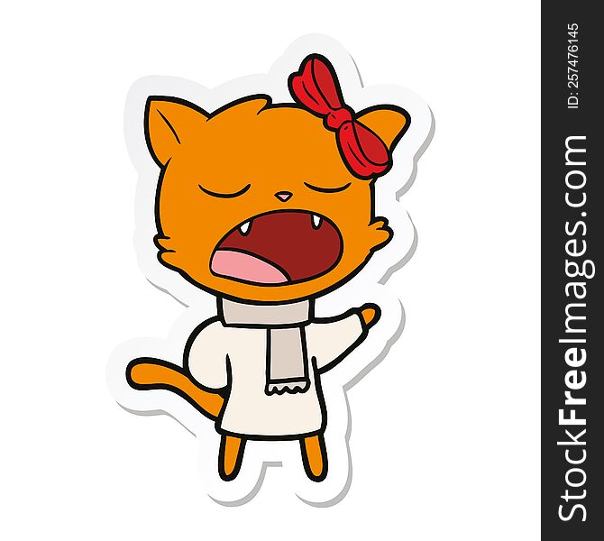 sticker of a cartoon cat in winter clothes