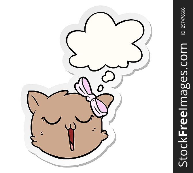 cartoon cat face with thought bubble as a printed sticker