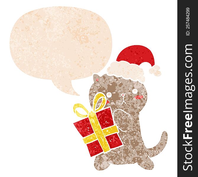 cute cartoon cat carrying christmas present with speech bubble in grunge distressed retro textured style. cute cartoon cat carrying christmas present with speech bubble in grunge distressed retro textured style