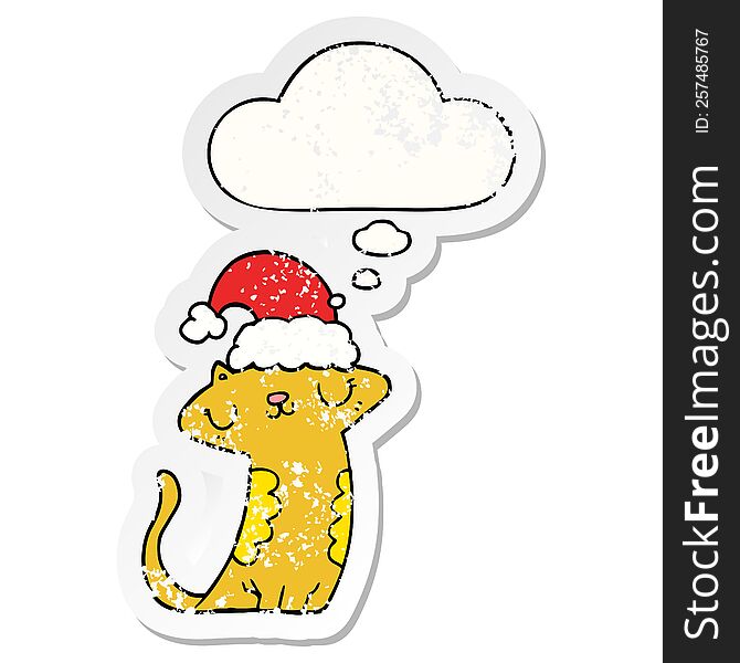 Cute Cartoon Cat Wearing Christmas Hat And Thought Bubble As A Distressed Worn Sticker