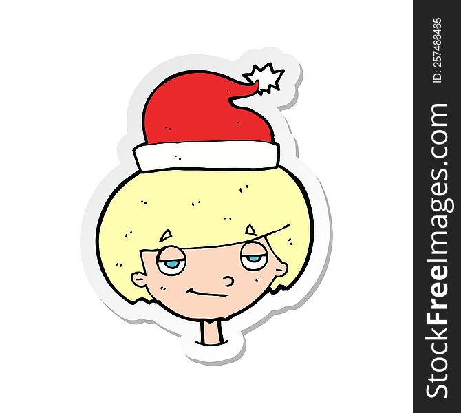 sticker of a cartoon boy in santa hat