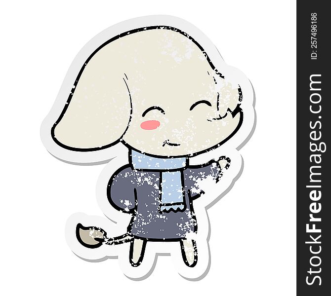 distressed sticker of a cute cartoon elephant in winter clothes