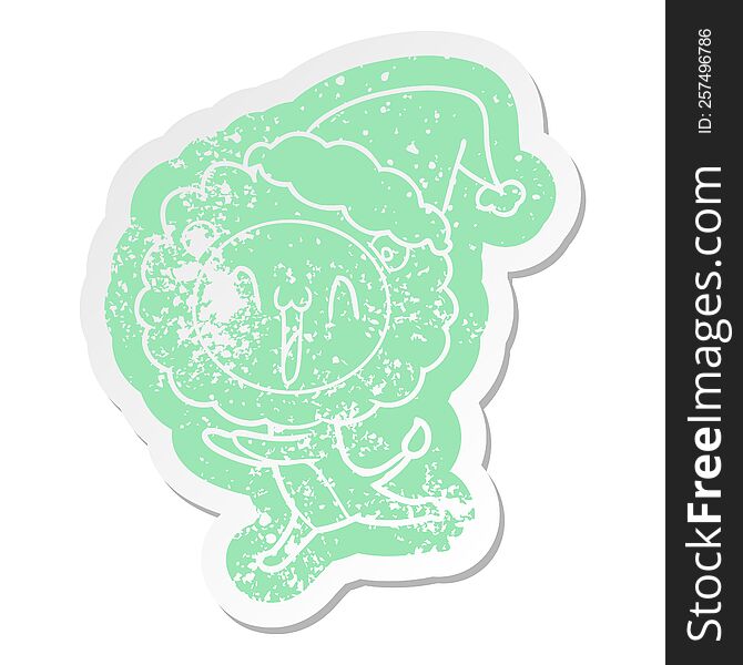 Happy Cartoon Distressed Sticker Of A Lion Wearing Santa Hat