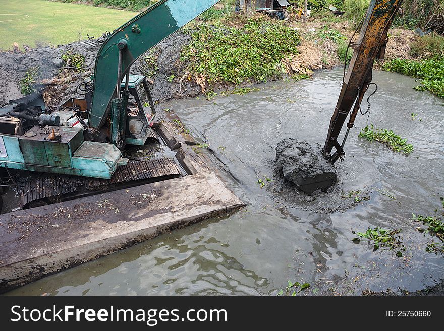 Dredging the canal