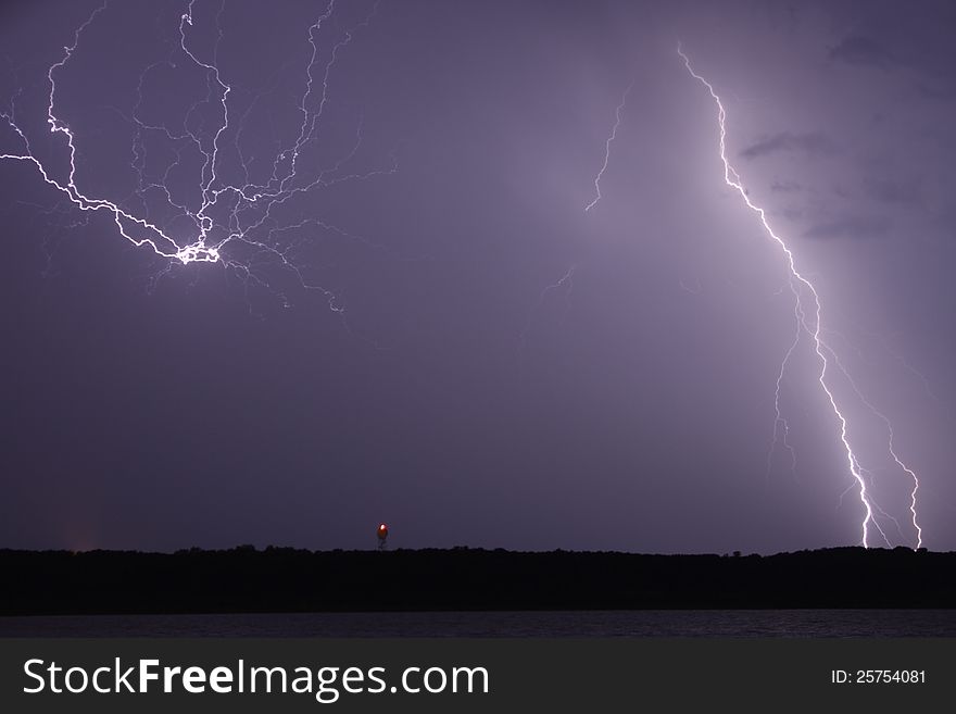 Lightning burst forms a rare and unusual ring and a star formation.