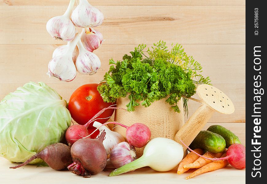 Different summers vegetables on table. Different summers vegetables on table