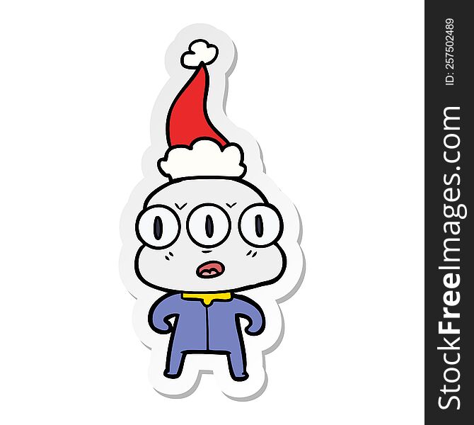 Sticker Cartoon Of A Three Eyed Alien Wearing Santa Hat