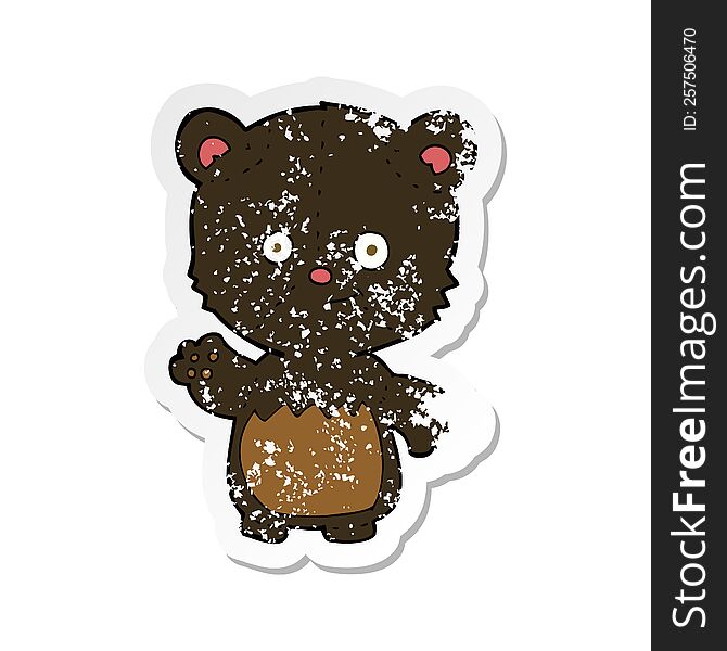 retro distressed sticker of a cartoon little black bear waving
