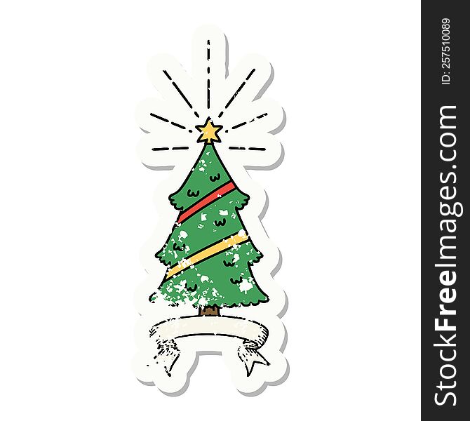 worn old sticker of a tattoo style christmas tree with star. worn old sticker of a tattoo style christmas tree with star
