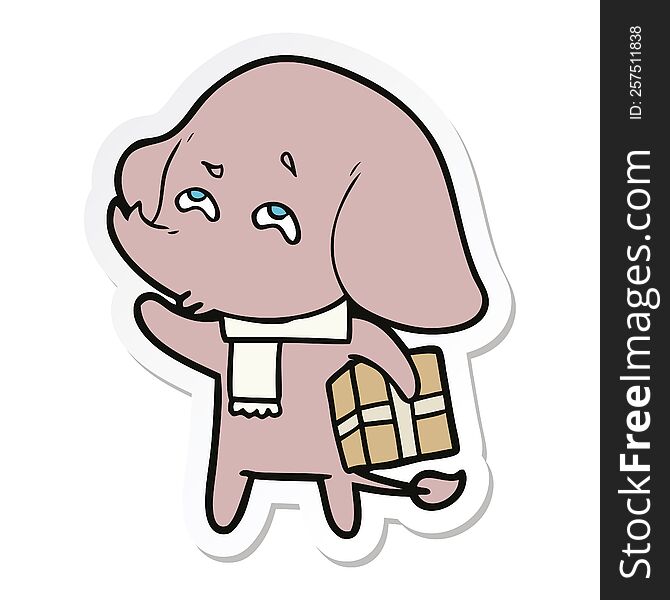 sticker of a cartoon elephant with gift remembering