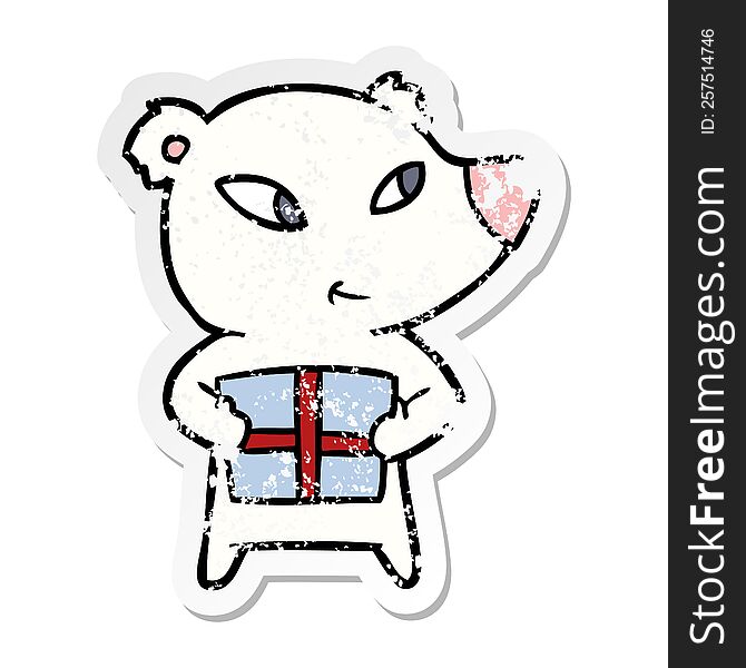 distressed sticker of a cute cartoon polar bear with xmas present