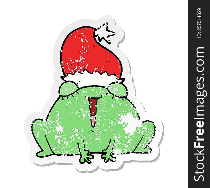 distressed sticker of a cute cartoon christmas frog