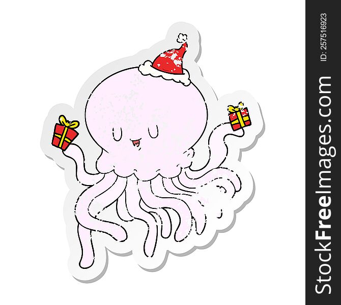 hand drawn distressed sticker cartoon of a jellyfish in love wearing santa hat