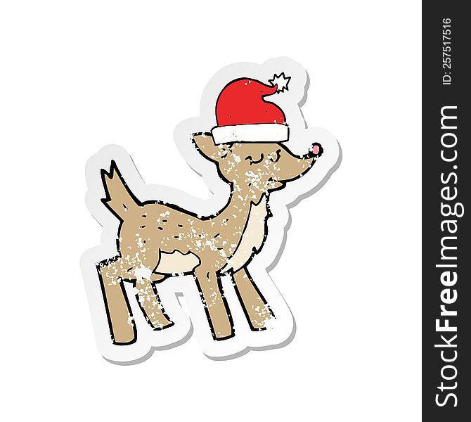 retro distressed sticker of a cartoon cute christmas reindeer