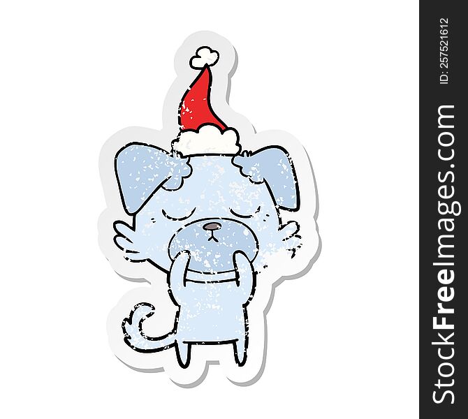Cute Distressed Sticker Cartoon Of A Dog Wearing Santa Hat