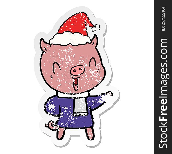 Happy Distressed Sticker Cartoon Of A Pig In Winter Clothes Wearing Santa Hat