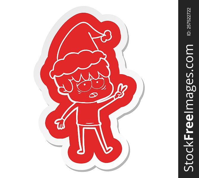 Cartoon  Sticker Of A Exhausted Boy Wearing Santa Hat