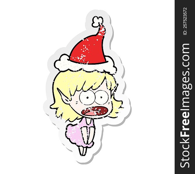 distressed sticker cartoon of a shocked elf girl wearing santa hat