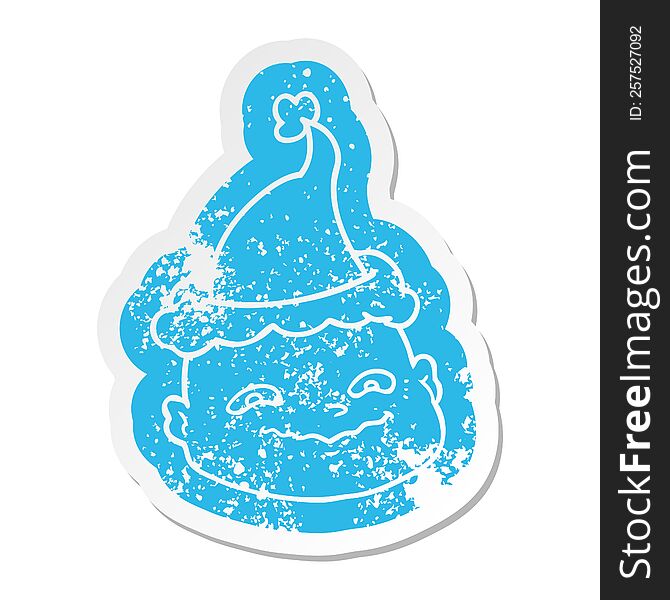 Cartoon Distressed Sticker Of A Bald Man Wearing Santa Hat