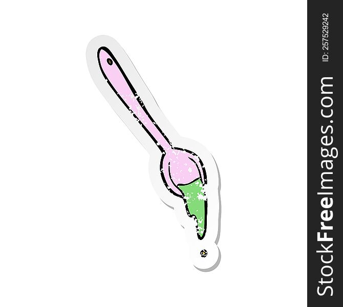 Retro Distressed Sticker Of A Cartoon Spoon