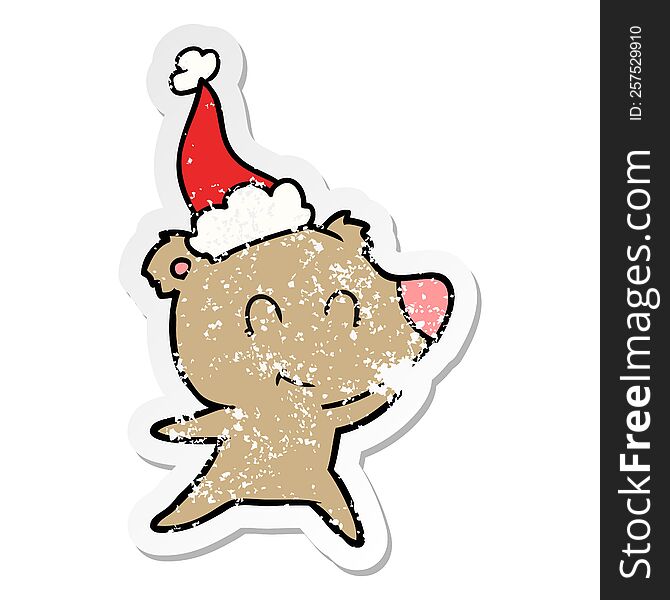 Female Bear Distressed Sticker Cartoon Of A Wearing Santa Hat