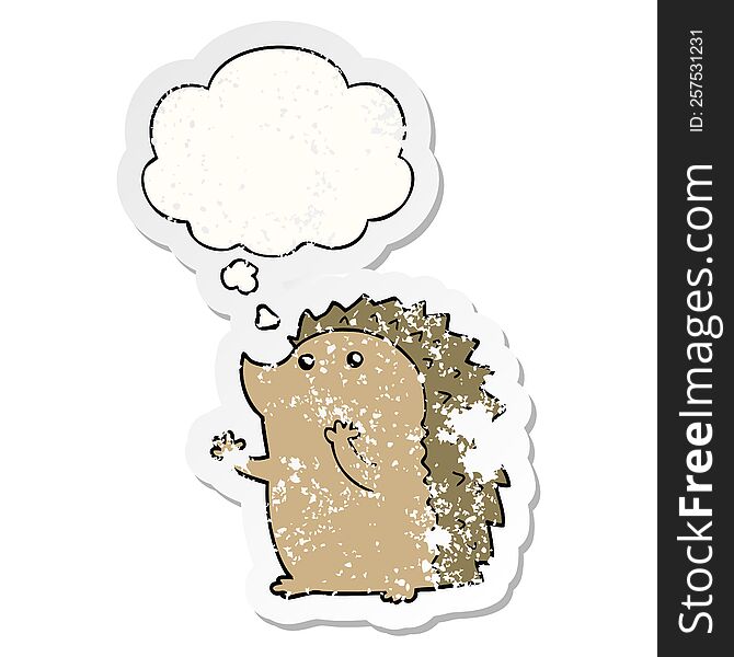 cartoon hedgehog with thought bubble as a distressed worn sticker