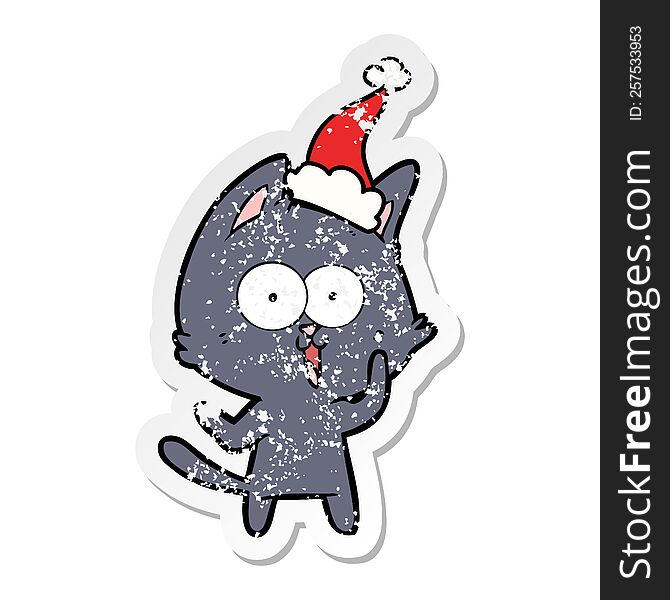 Funny Distressed Sticker Cartoon Of A Cat Wearing Santa Hat