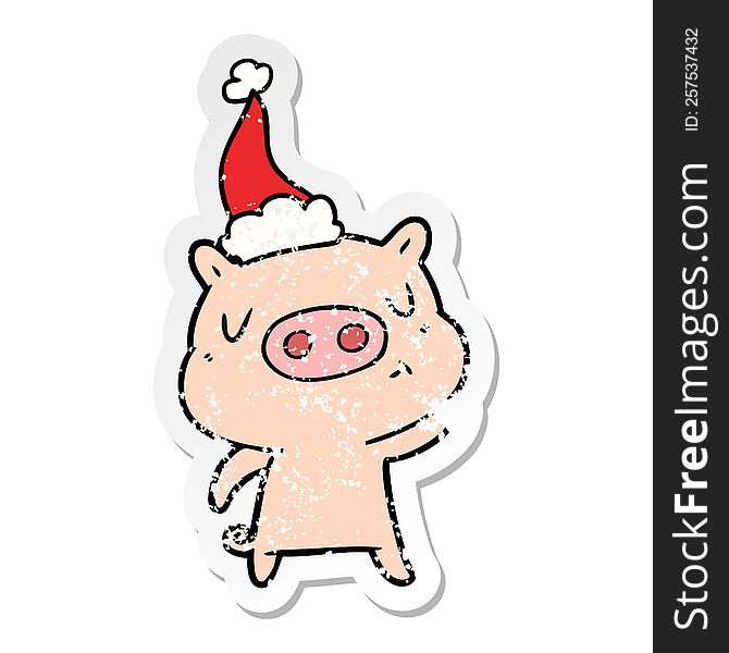 Distressed Sticker Cartoon Of A Content Pig Wearing Santa Hat