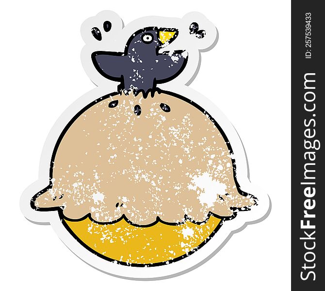 distressed sticker of a cartoon blackbird in a pie
