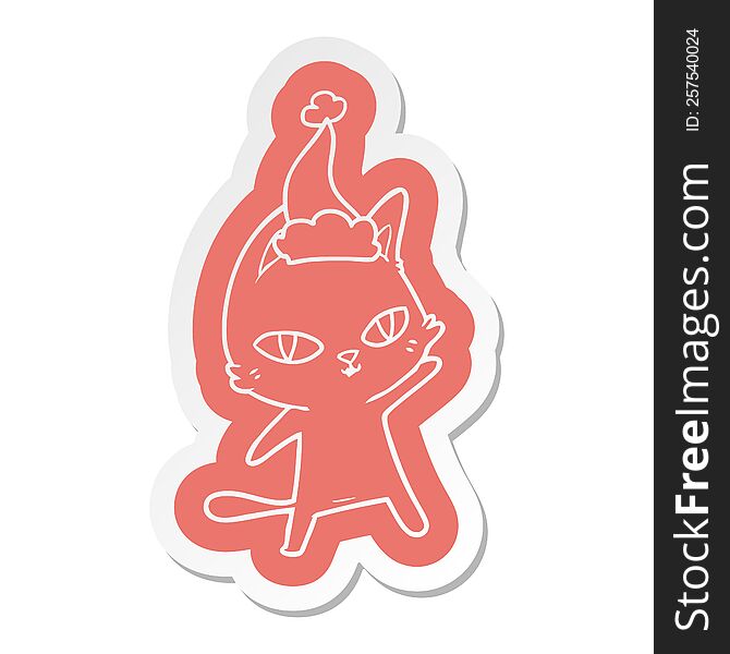 cartoon  sticker of a cat staring wearing santa hat