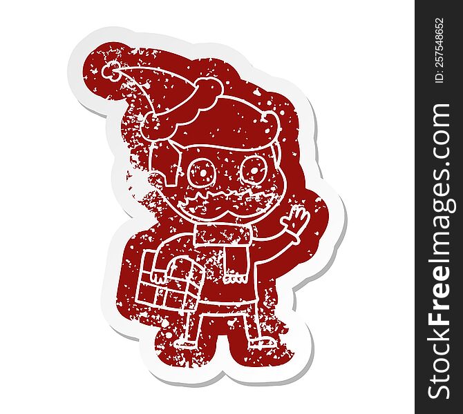 Cartoon Distressed Sticker Of A Man With Mustache And Christmas Present Wearing Santa Hat