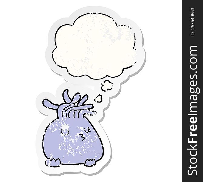 cartoon sea anemone with thought bubble as a distressed worn sticker