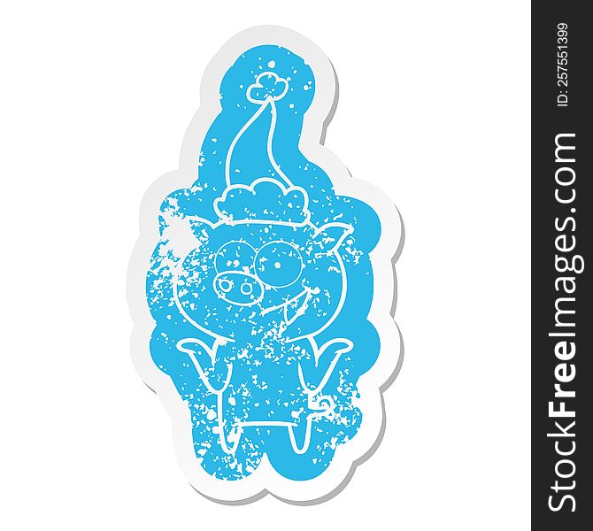 quirky cartoon distressed sticker of a pig with no worries wearing santa hat
