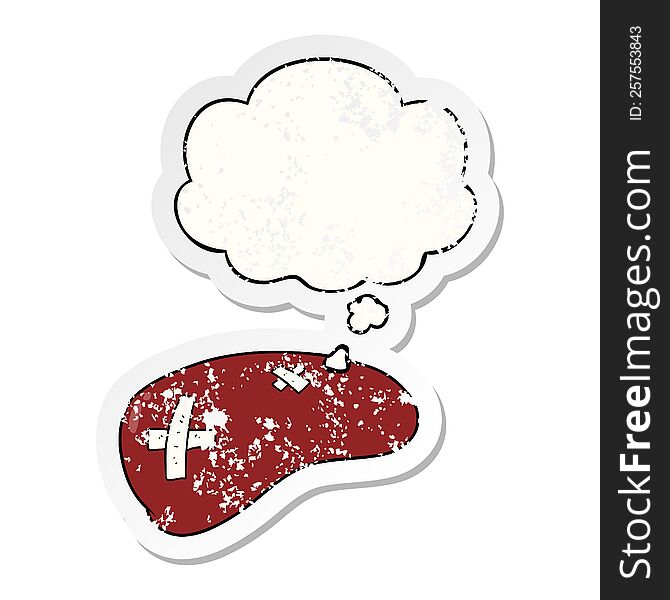 cartoon repaired liver with thought bubble as a distressed worn sticker