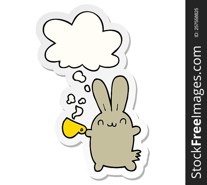 cute cartoon rabbit drinking coffee with thought bubble as a printed sticker