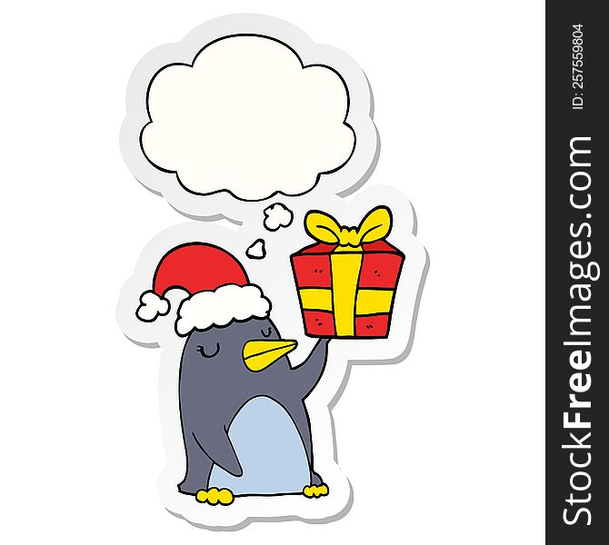 Cartoon Penguin With Christmas Present And Thought Bubble As A Printed Sticker