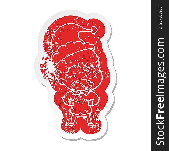 cartoon distressed sticker of a shocked man wearing santa hat