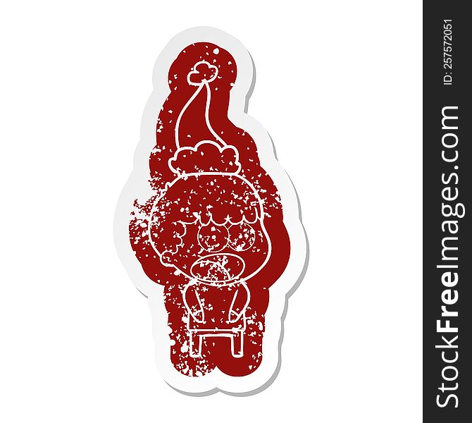 quirky cartoon distressed sticker of a shocked man wearing santa hat