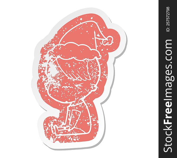 quirky cartoon distressed sticker of a annoyed hipster girl wearing santa hat