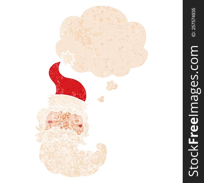 Cartoon Santa Face And Thought Bubble In Retro Textured Style