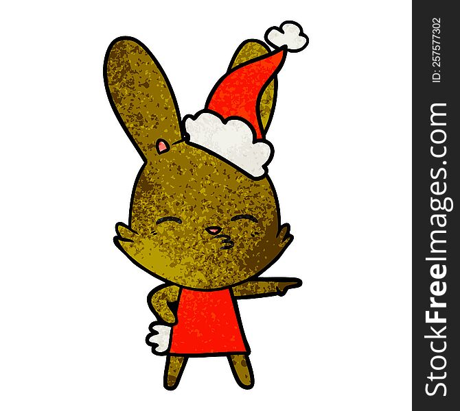 curious bunny hand drawn textured cartoon of a wearing santa hat. curious bunny hand drawn textured cartoon of a wearing santa hat